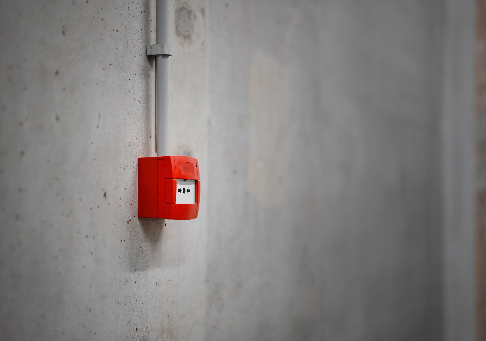 alarm box on gray wall